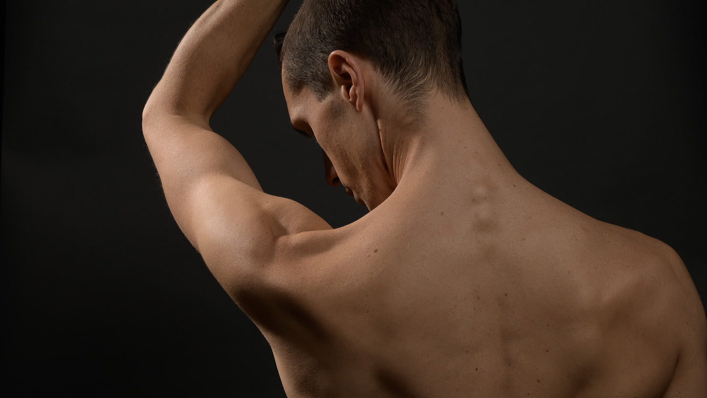 Matthew Doolin - view from the back, hand over head